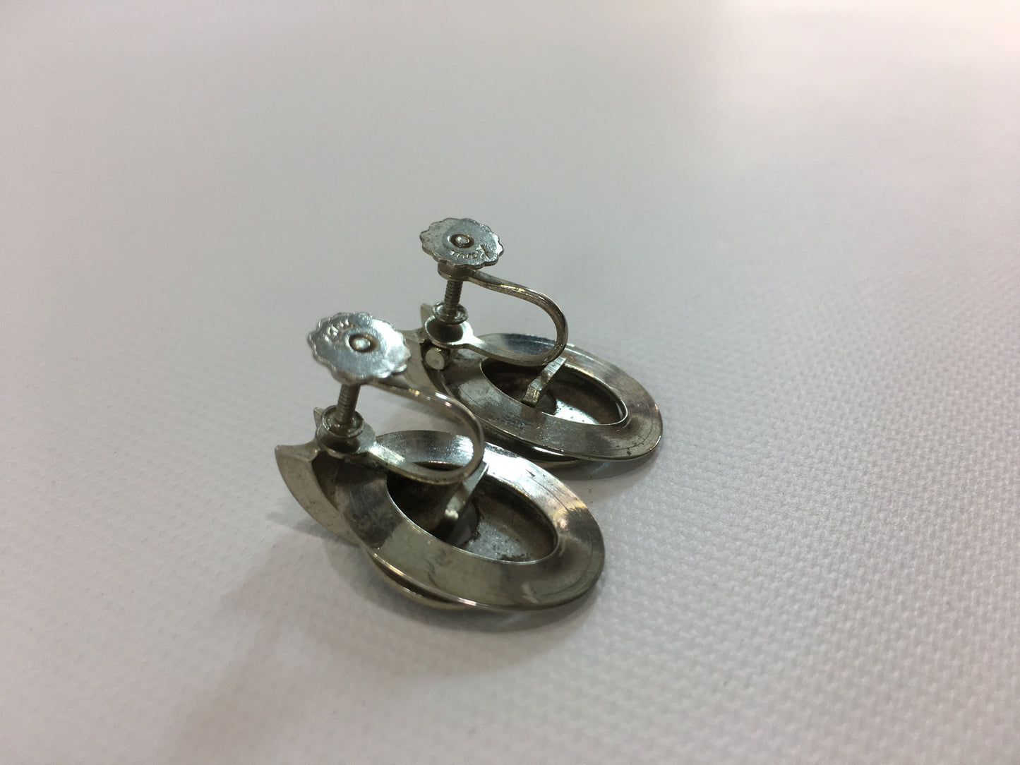 Karu Silver Tone Earrings Screw Back Oval Geometric Design