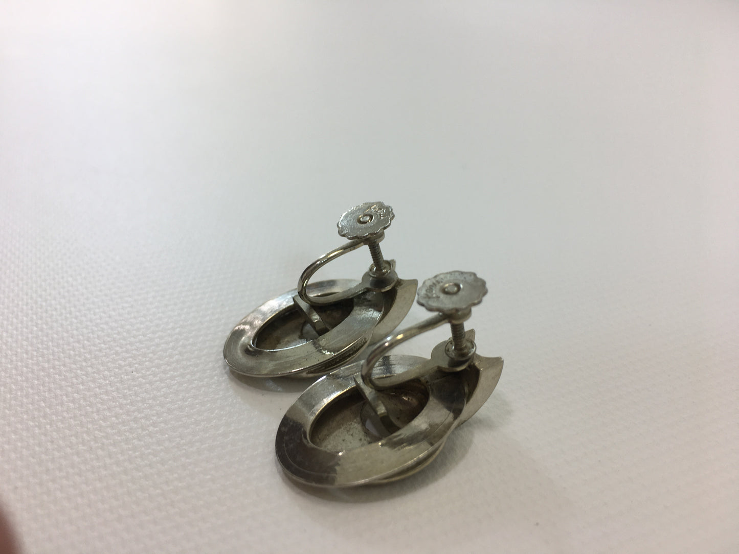 Karu Silver Tone Earrings Screw Back Oval Geometric Design