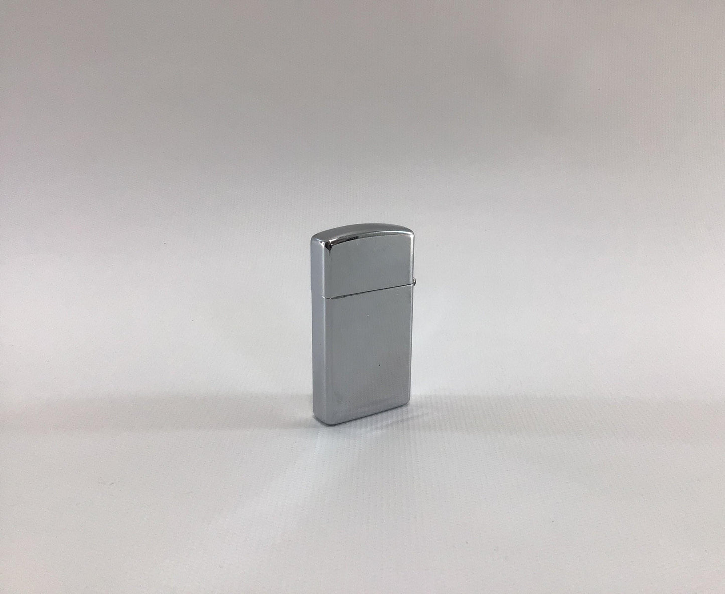 Zippo Slim Cigarette Lighter High Polish Chrome Vintage 1996