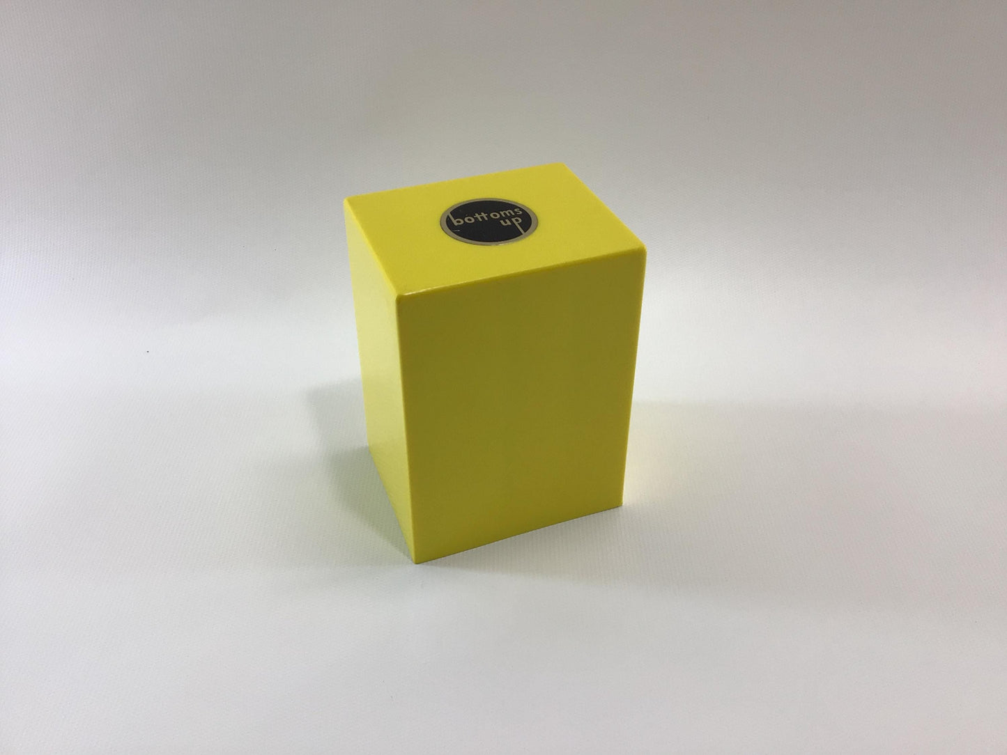 Bottoms Up Mid Century Novelty Storage Container Box Yellow and Black Hard Plastic Weighted Trap Door Bottom
