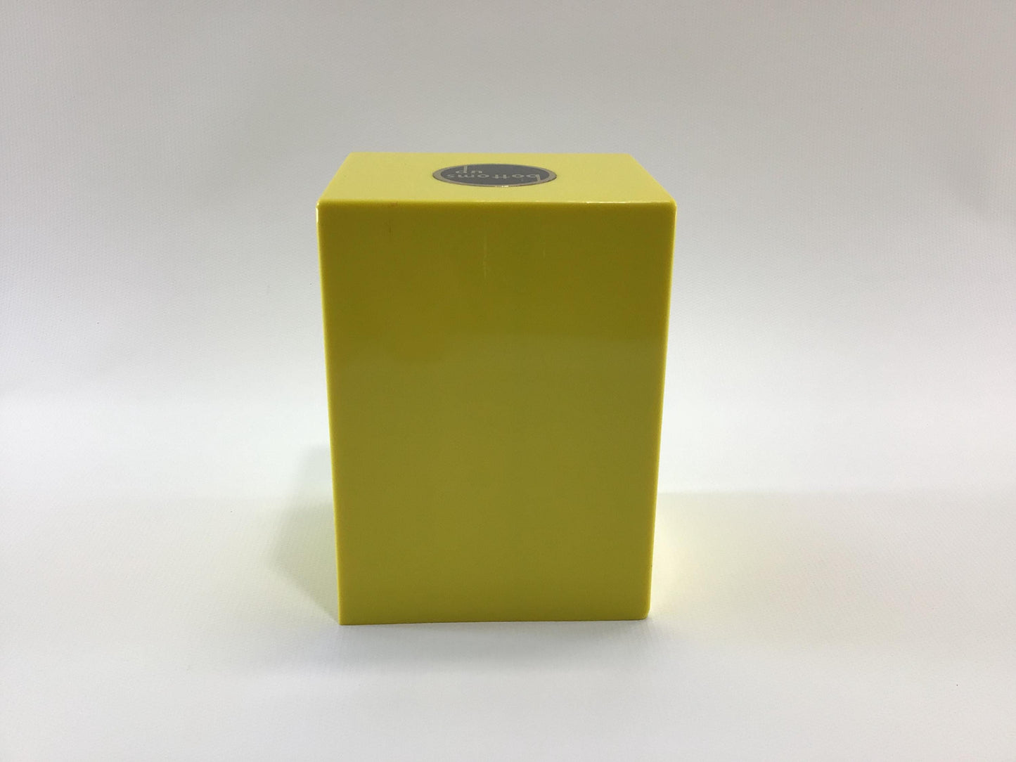 Bottoms Up Mid Century Novelty Storage Container Box Yellow and Black Hard Plastic Weighted Trap Door Bottom