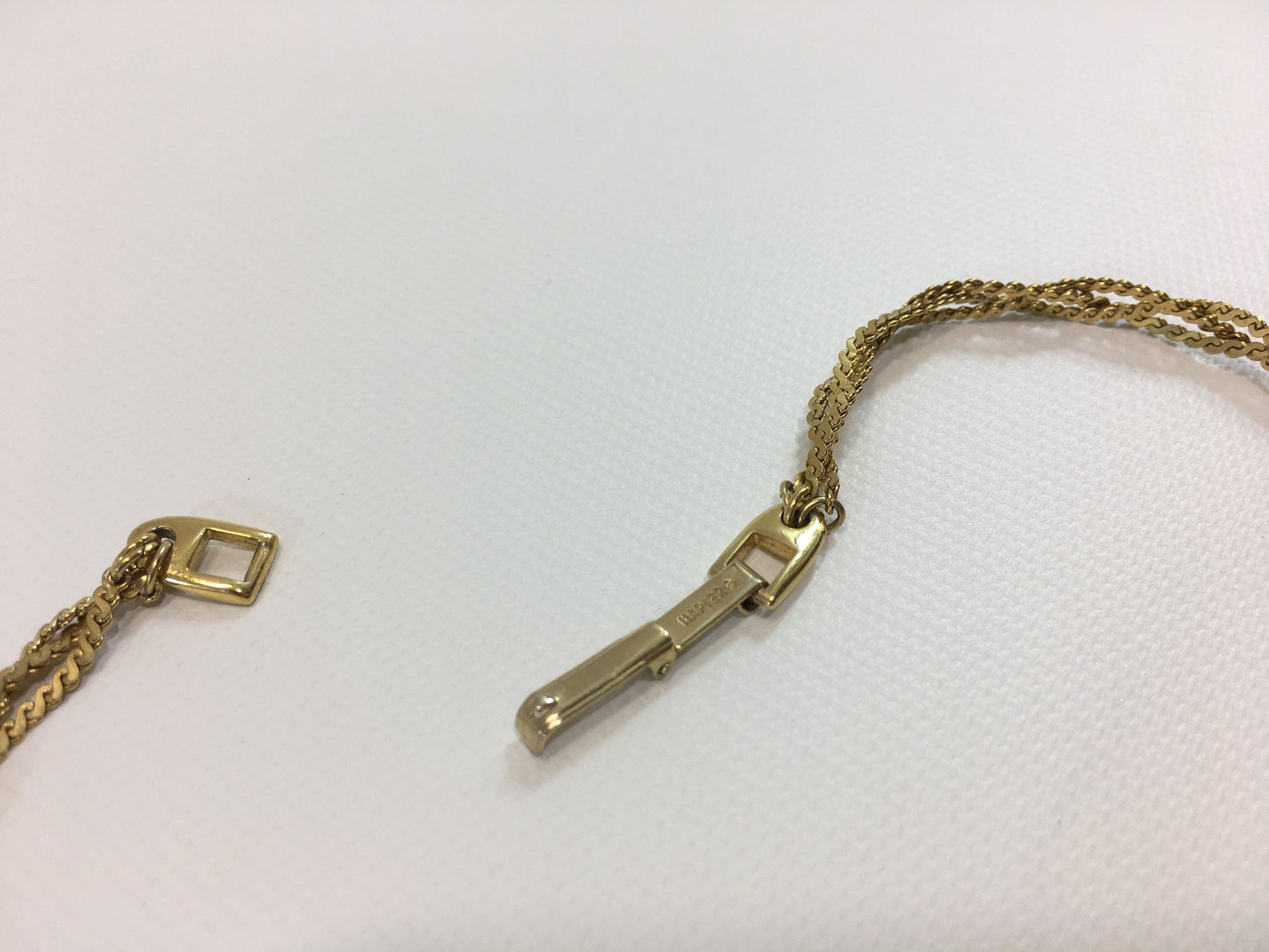 Napier Gold Tone Braided Chain Three Strand Necklace