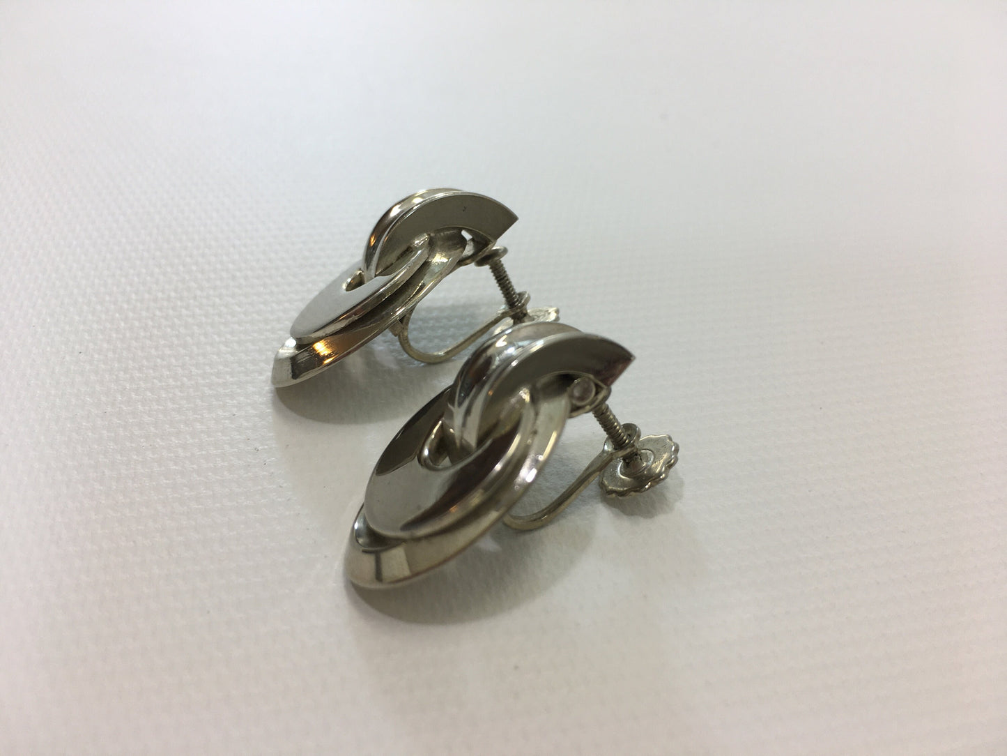 Karu Silver Tone Earrings Screw Back Oval Geometric Design
