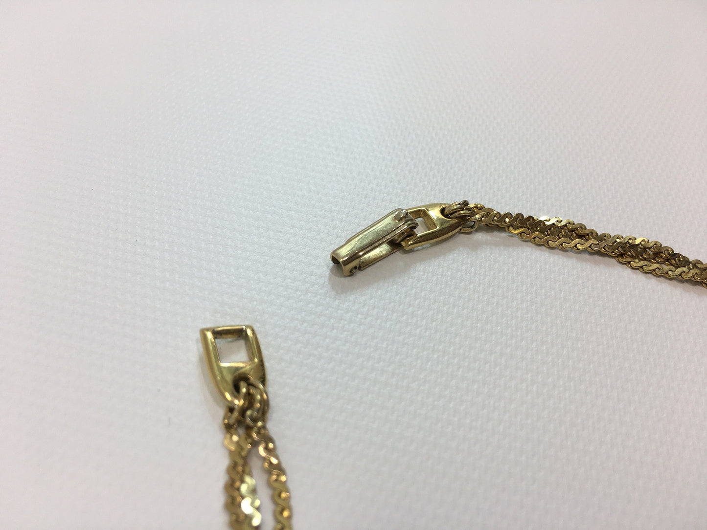 Napier Gold Tone Braided Chain Three Strand Necklace