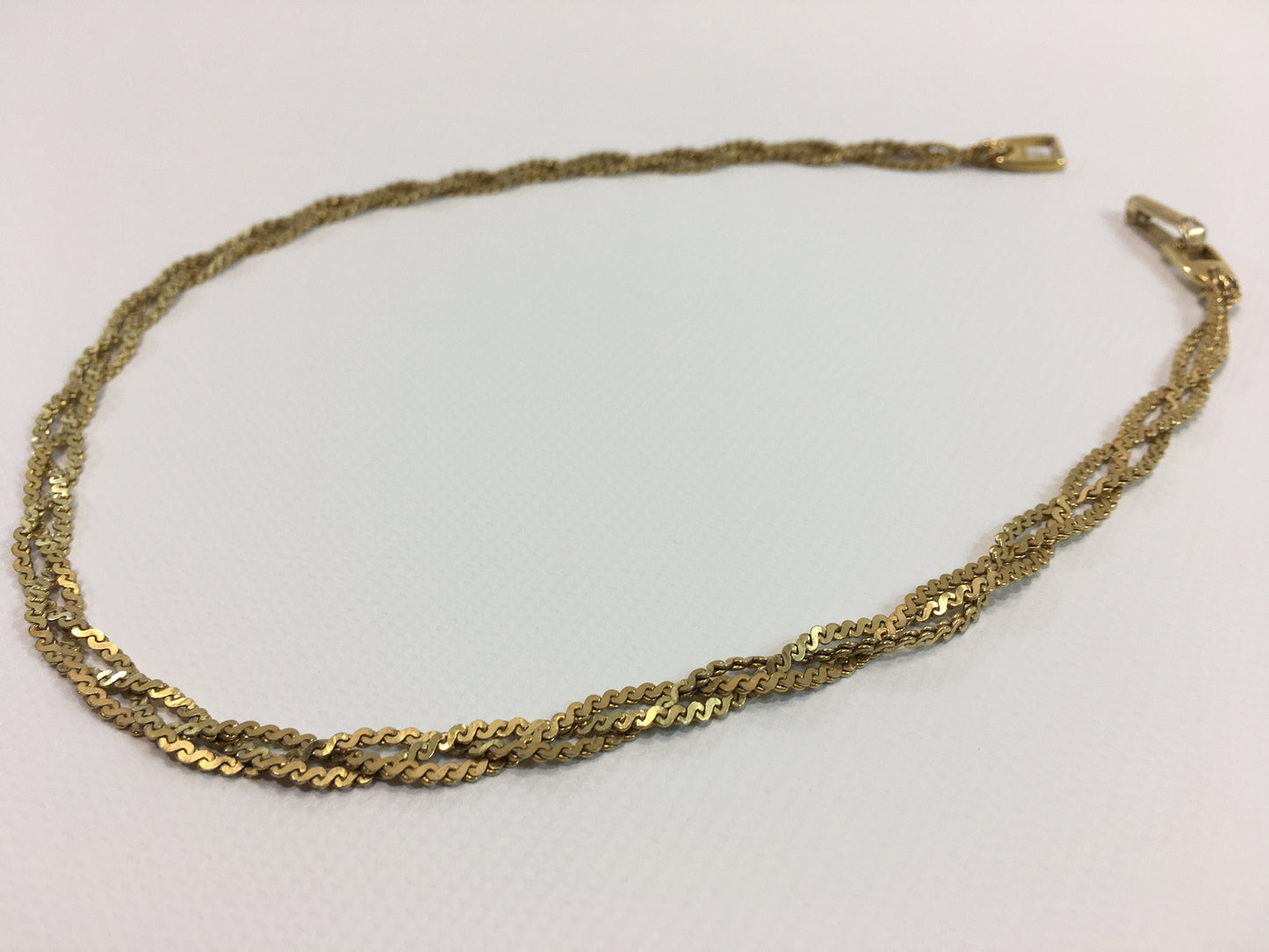 Napier Gold Tone Braided Chain Three Strand Necklace