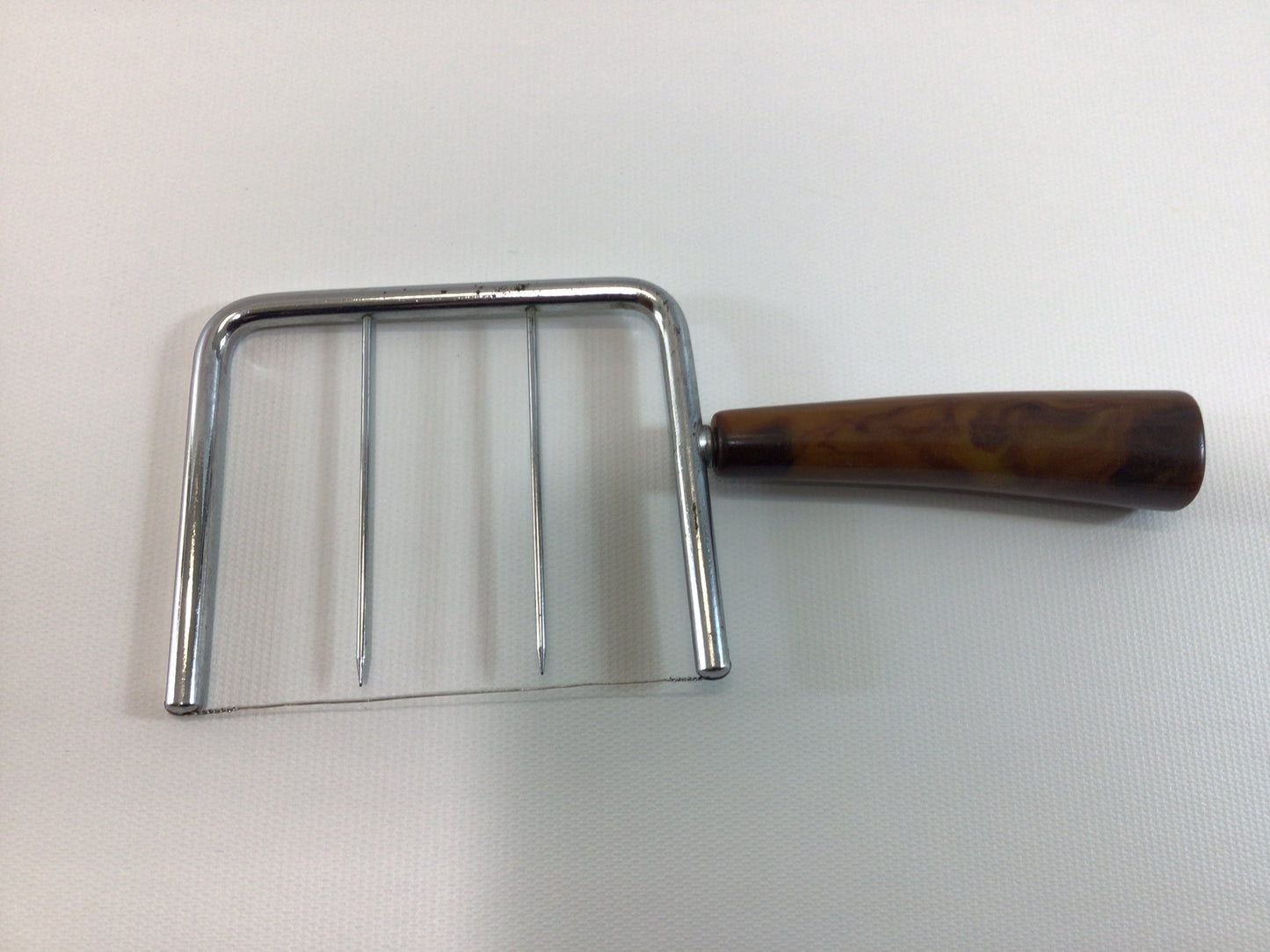 Cheese Cutter Vintage Kitchen Utensil Gadget with Brown Swirl Handle