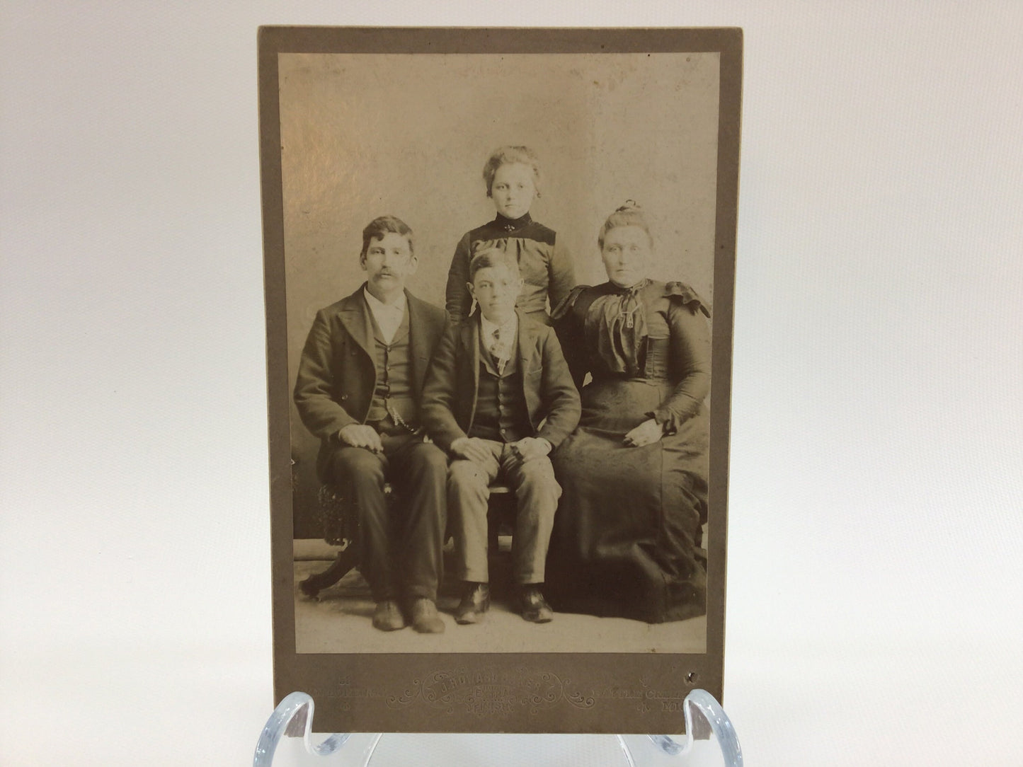 Victorian era J Baker Cabinet Card Photo Family Studio Portrait