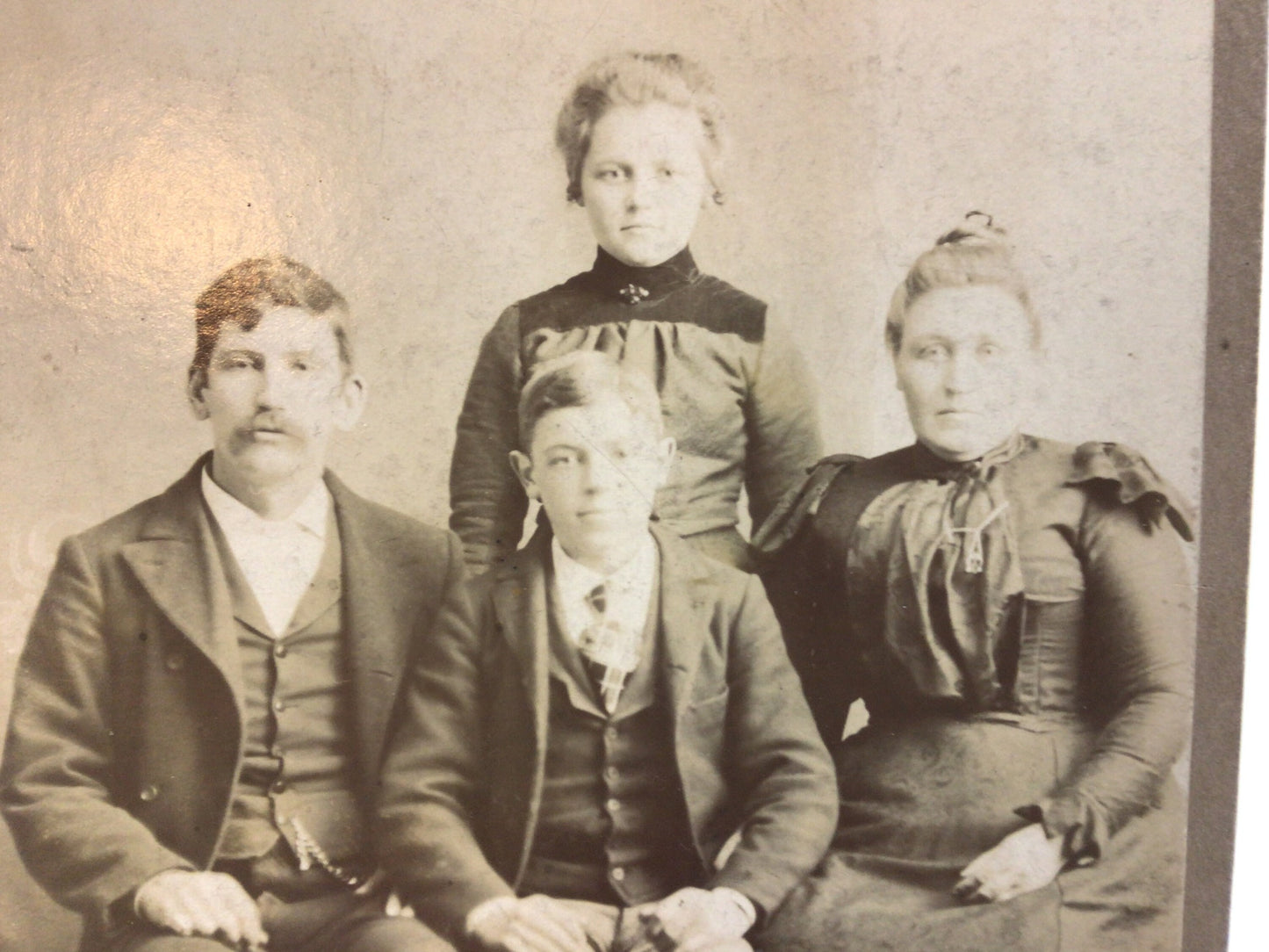 Victorian era J Baker Cabinet Card Photo Family Studio Portrait