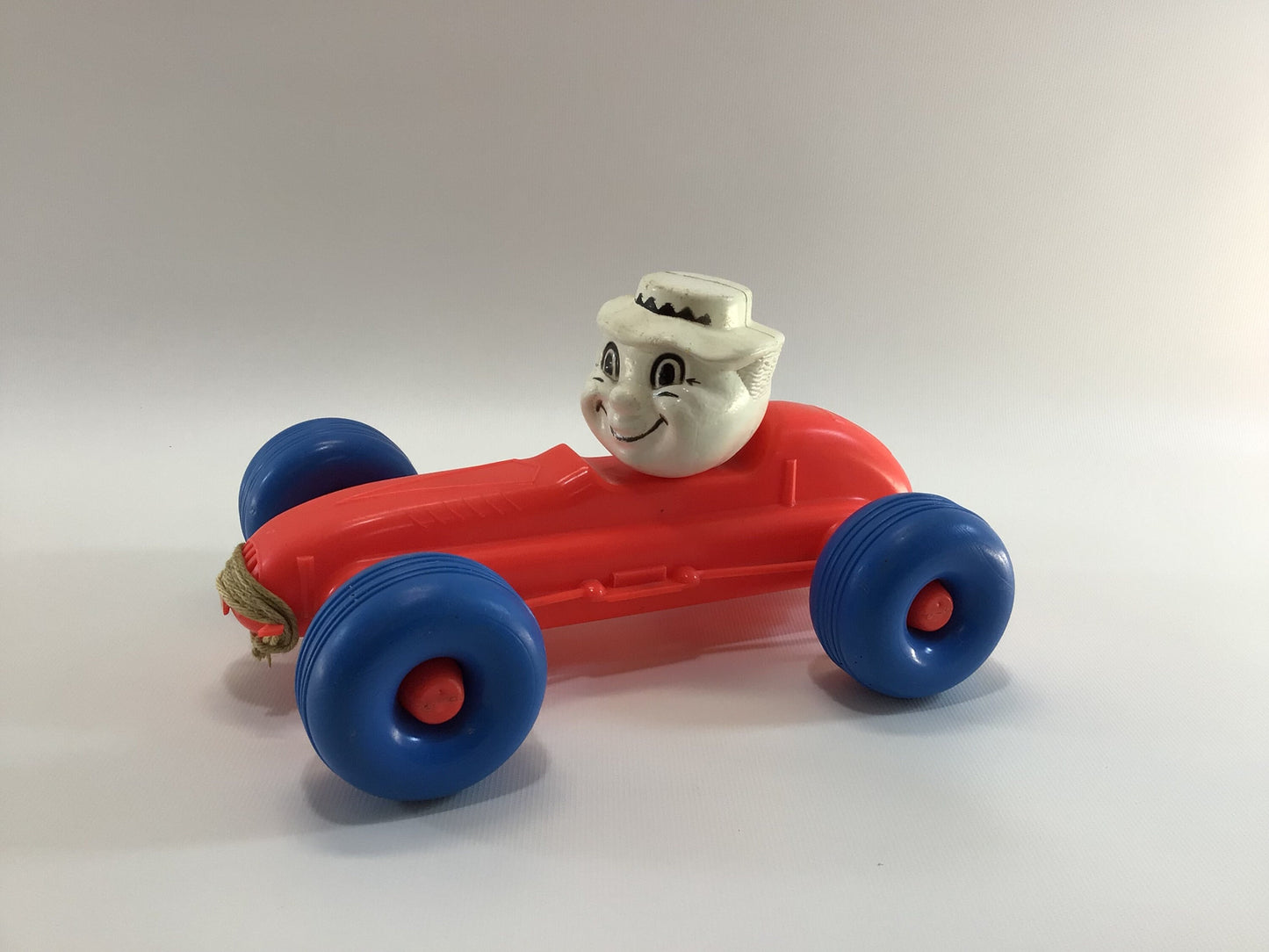 Blow Mold Pull Toy Race Car Hard Plastic No 7 Circus Clown Driver Red Orange with Blue Balloon Tires Boattail Era Style 10" Racer Vintage Dime Store