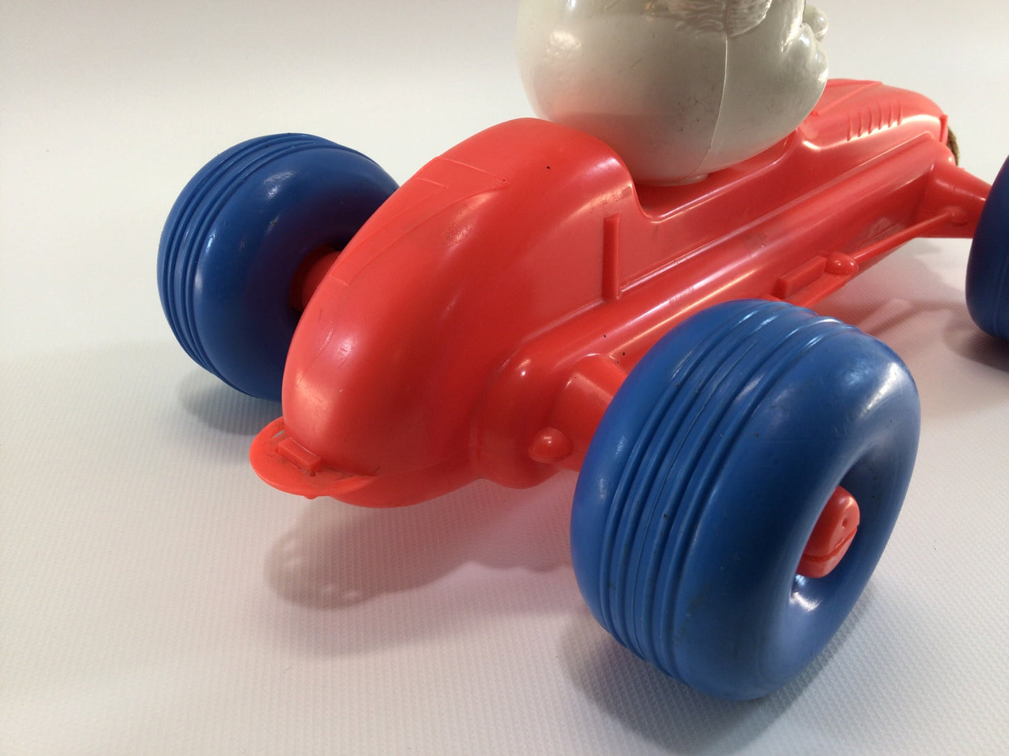 Blow Mold Pull Toy Race Car Hard Plastic No 7 Circus Clown Driver Red Orange with Blue Balloon Tires Boattail Era Style 10" Racer Vintage Dime Store