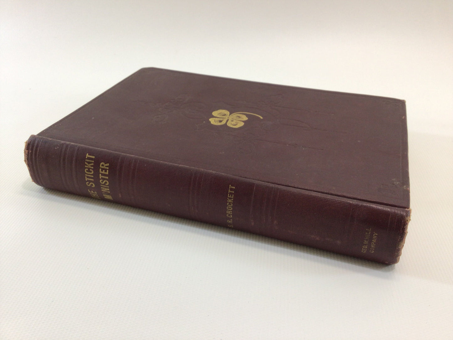 Antique Christian Novel The Stickit Minister by S R Crockett Red Hardcover Embossed Gold Gilt Four Leaf Clover Hill Publishing Company