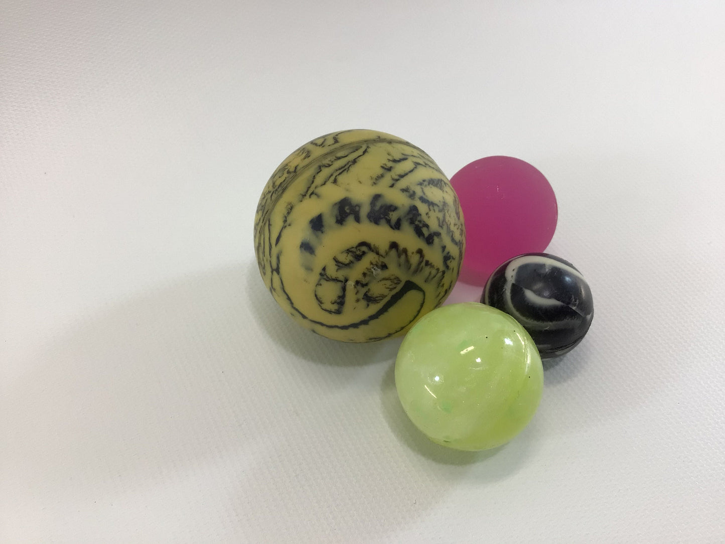 Super Balls Lot of 4 Vintage Dime Store Toy Bouncing Rubber Swirls Glow in the Dark Pink Translucent Balls