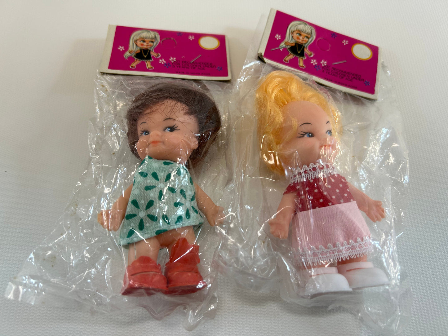 Vintage Dime Store Doll 3 1/4" Set of Two Small Retro Dolls Brown Blonde Hair Red Pink and Green Dress In Original Packages