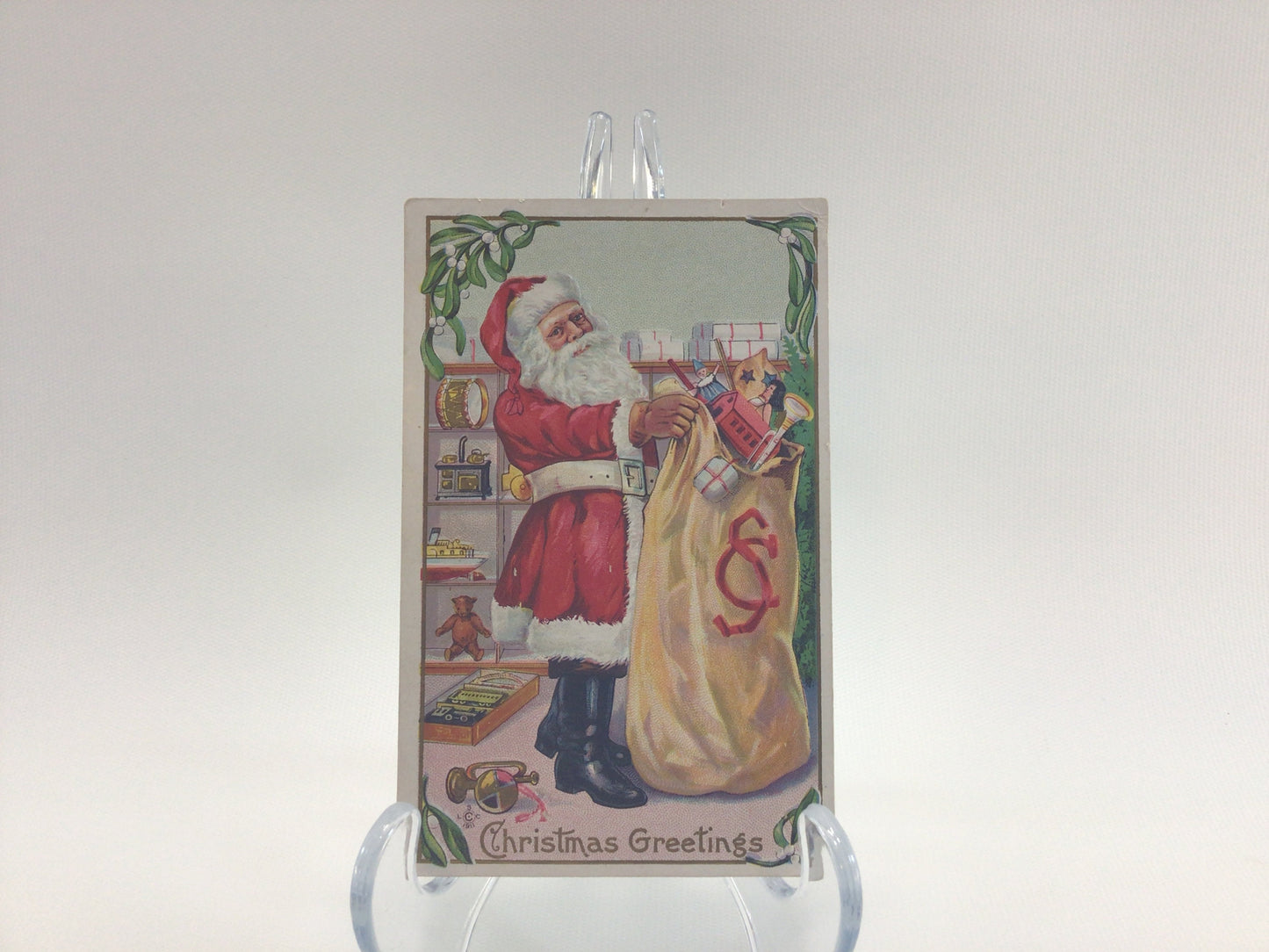 Antique Christmas Postcard Embossed Santa Delivering Toys Collectible Victorian Ephemera