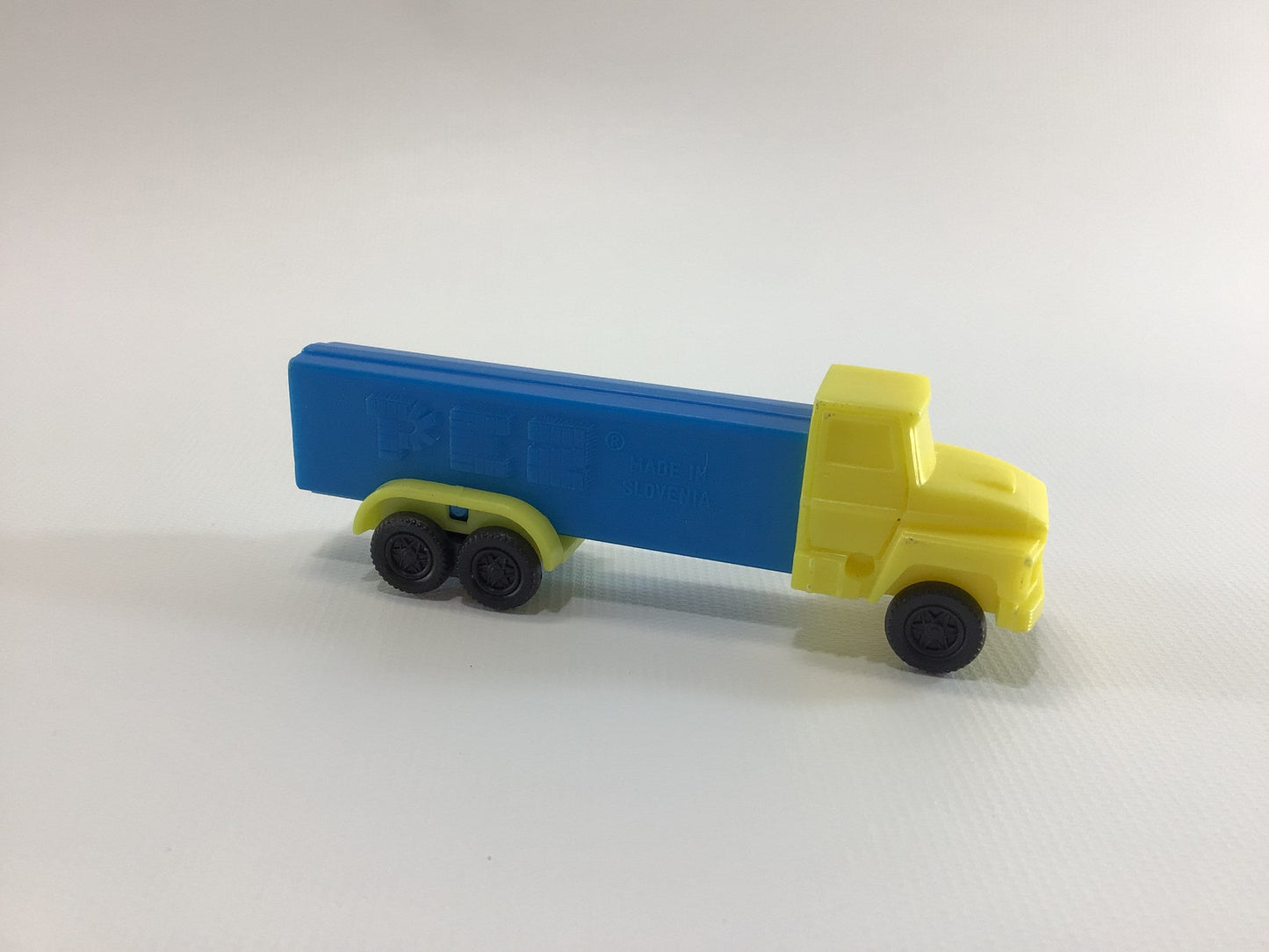 PEZ Tractor Trailer Truck Dispenser Vintage Toy Candy Container Made in Slovenia Yellow Blue