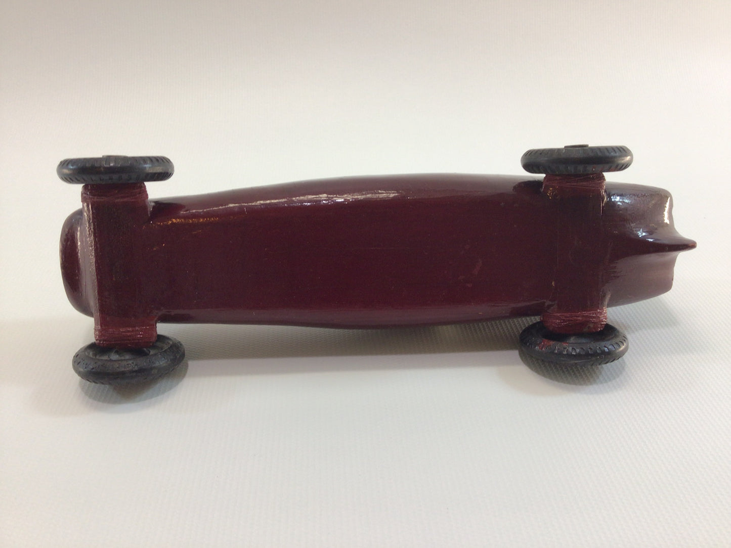 Early Pinewood Derby Race Car Dark Red Fins Boattail Era Style Vintage Handcrafted Wooden Toy