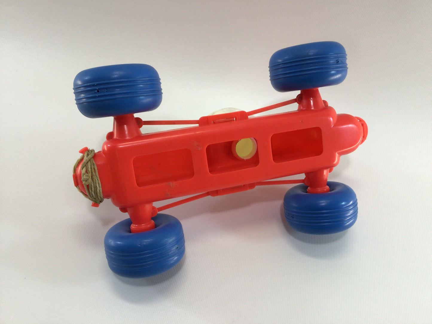 Blow Mold Pull Toy Race Car Hard Plastic No 7 Circus Clown Driver Red Orange with Blue Balloon Tires Boattail Era Style 10" Racer Vintage Dime Store