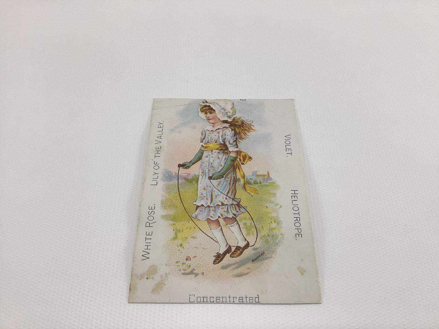 Antique White Rose Lily of the Valley Trade Card Girl Swinging Victorian Advertising Ephemera