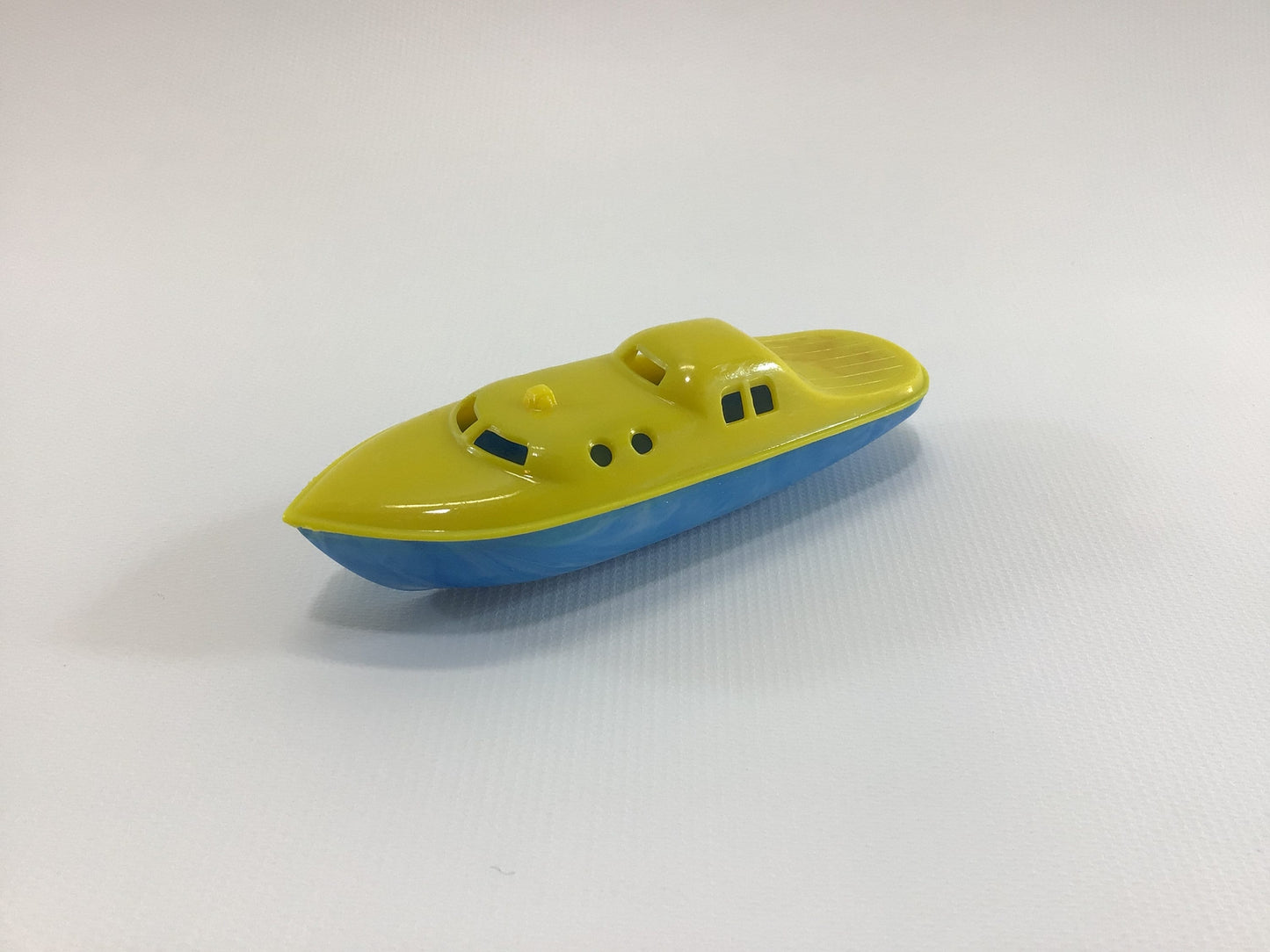 Banner 4" Toy Boat Vintage Hard Plastic Speedboat Yellow with Blue Hull