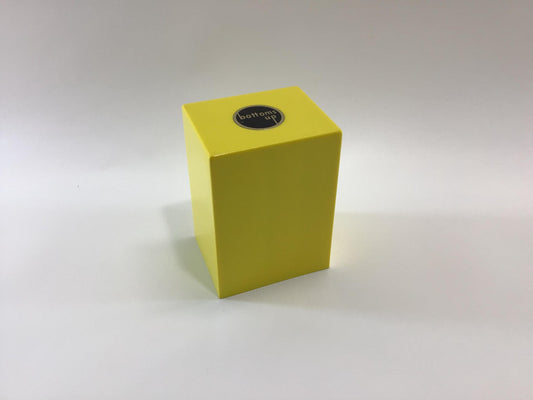 Bottoms Up Mid Century Novelty Storage Container Box Yellow and Black Hard Plastic Weighted Trap Door Bottom