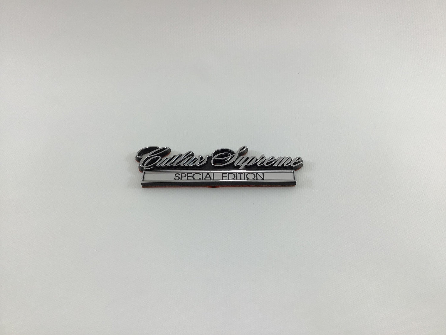 Oldsmobile Cutlass Supreme Special Edition Badge Emblem Vintage Automobile OEM Trim Part