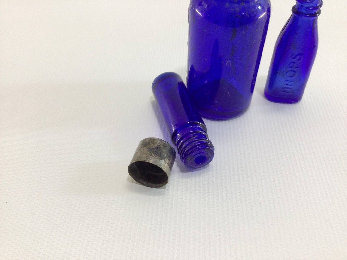 Cobalt Blue Glass Miniature Antique Bottles Bromo-Seltzer Vick's Drops and Metal Screw Top