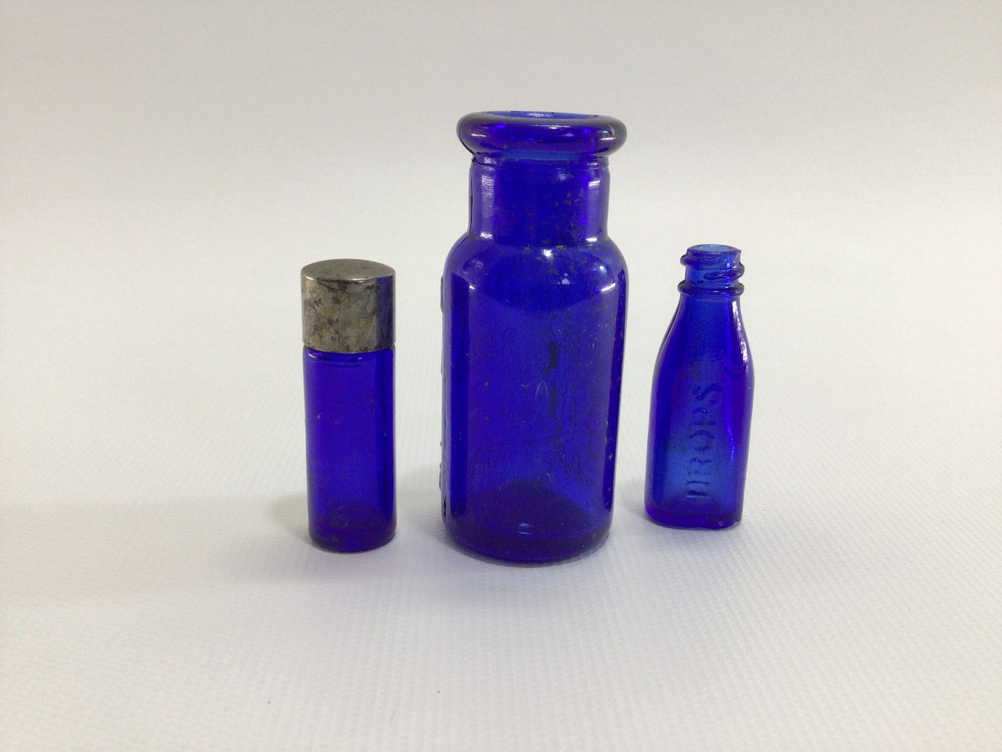 Cobalt Blue Glass Miniature Antique Bottles Bromo-Seltzer Vick's Drops and Metal Screw Top