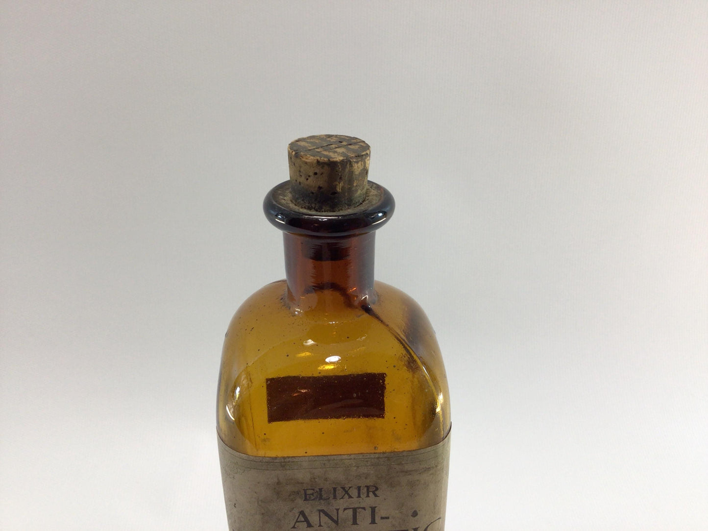 Antique Home Remedies Cork Top Paper Label Bottle Anti-Asthmatic Elixir Eli Lilly Company Indianapolis