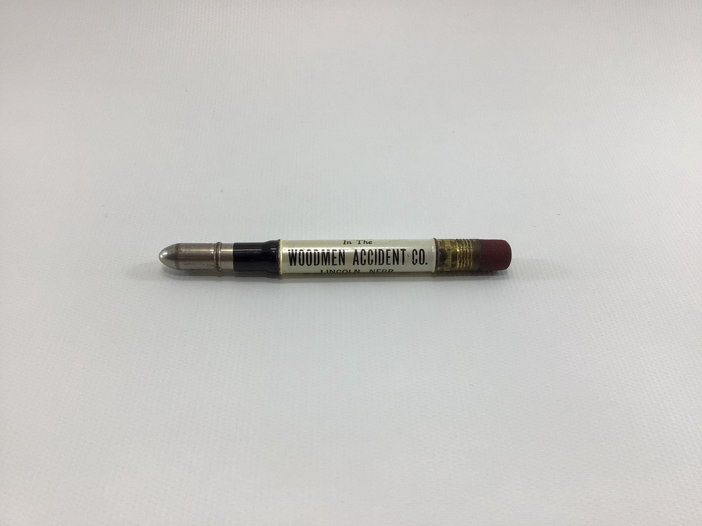 Vintage Advertising White Bullet Pencil Woodmen Accident Company Lincoln Nebraska