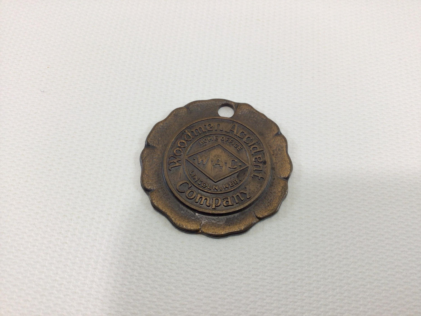 Bronze Keychain Medallion Woodmen Accident Company Vintage Employee Award Advertising