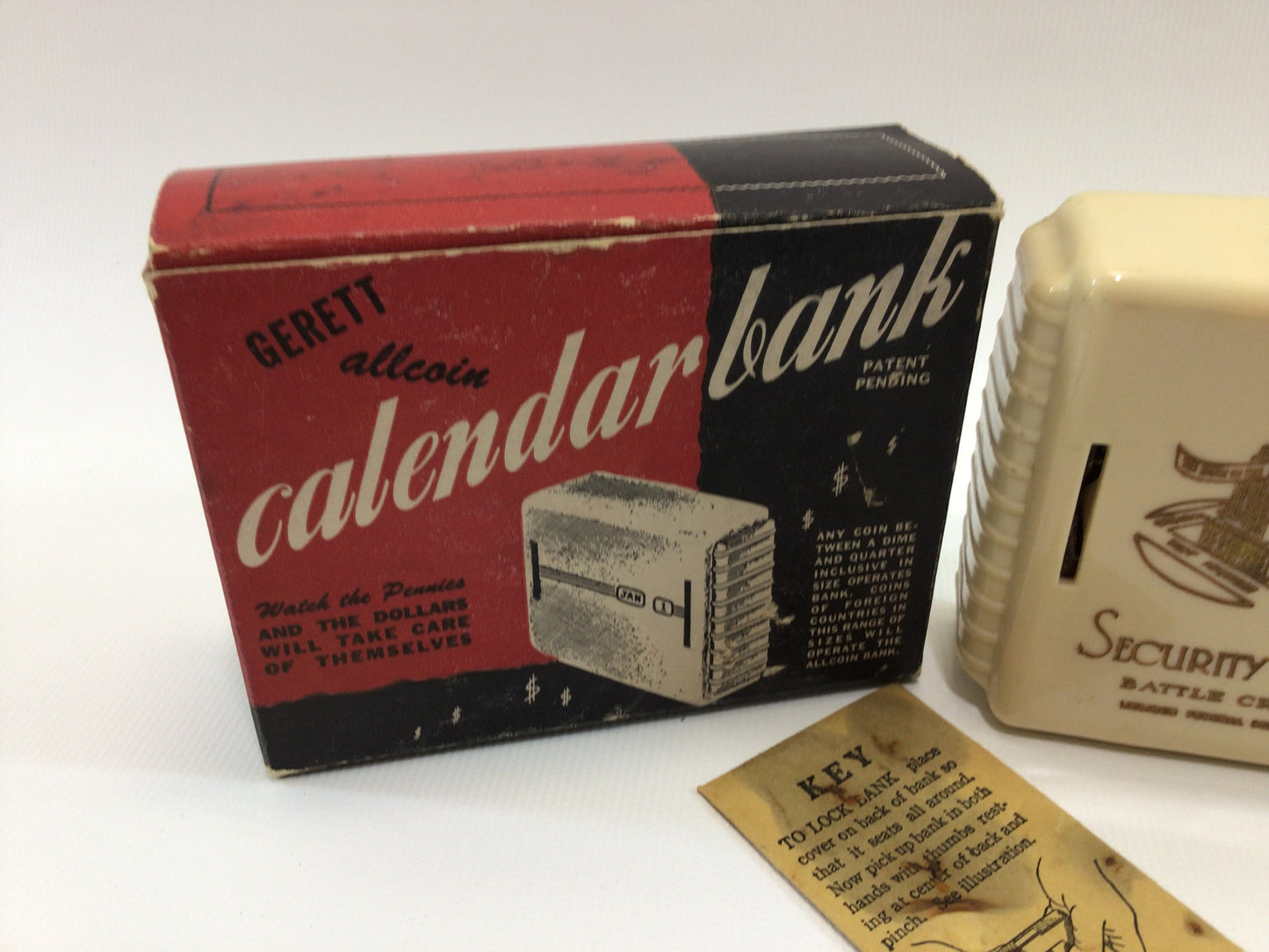 Calendar Coin Bank Vintage Advertising Battle Creek Michigan Gerett Allcoin