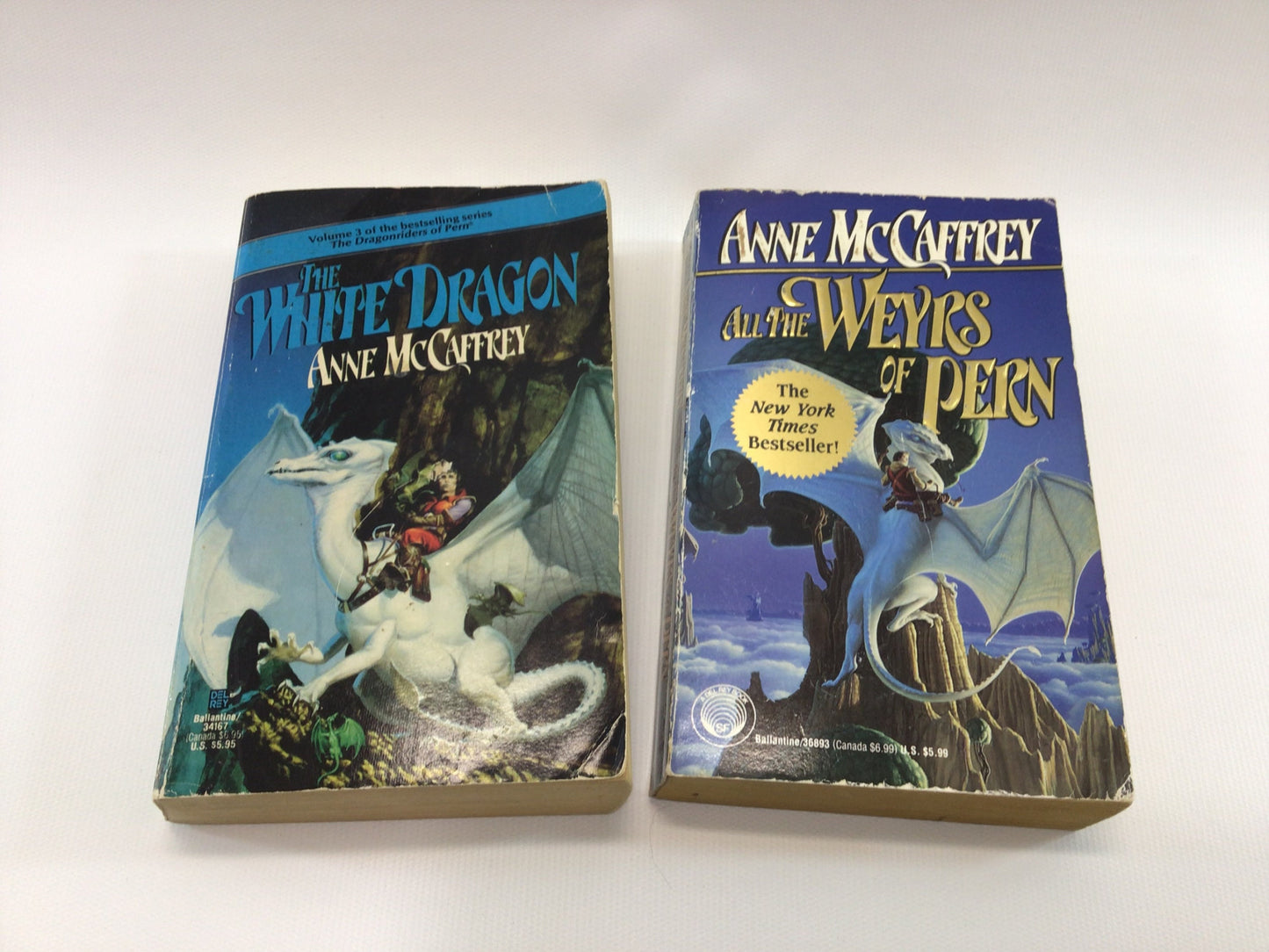 Fantasy Adventure Novels The White Dragon and All the Weyrs of Pern Paperback by Anne McCaffrey