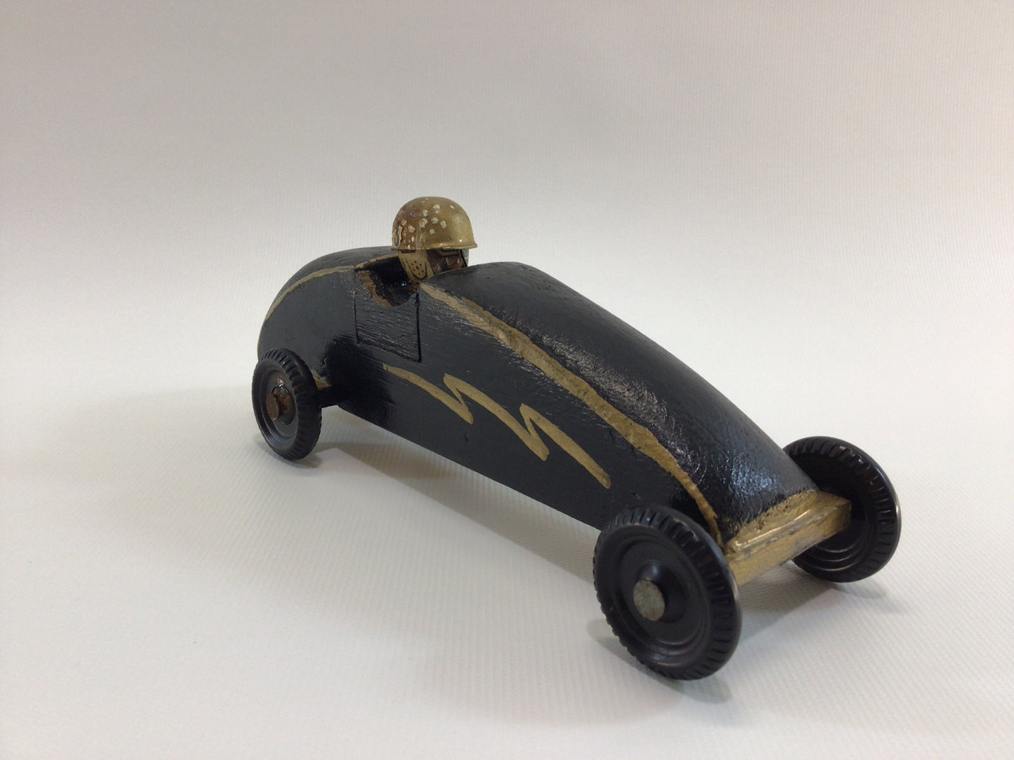 Early Pinewood Derby Race Car Black Gold with Driver Boattail Era Style Vintage Handcrafted Wooden Toy