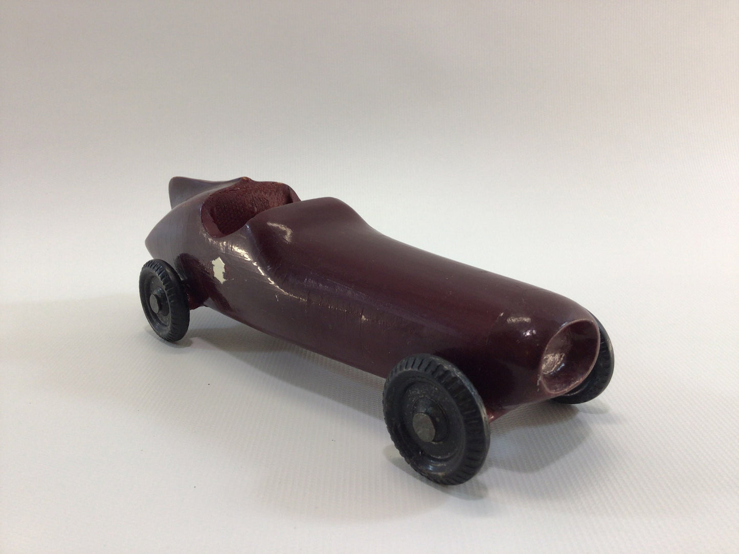 Early Pinewood Derby Race Car Dark Red Fins Boattail Era Style Vintage Handcrafted Wooden Toy