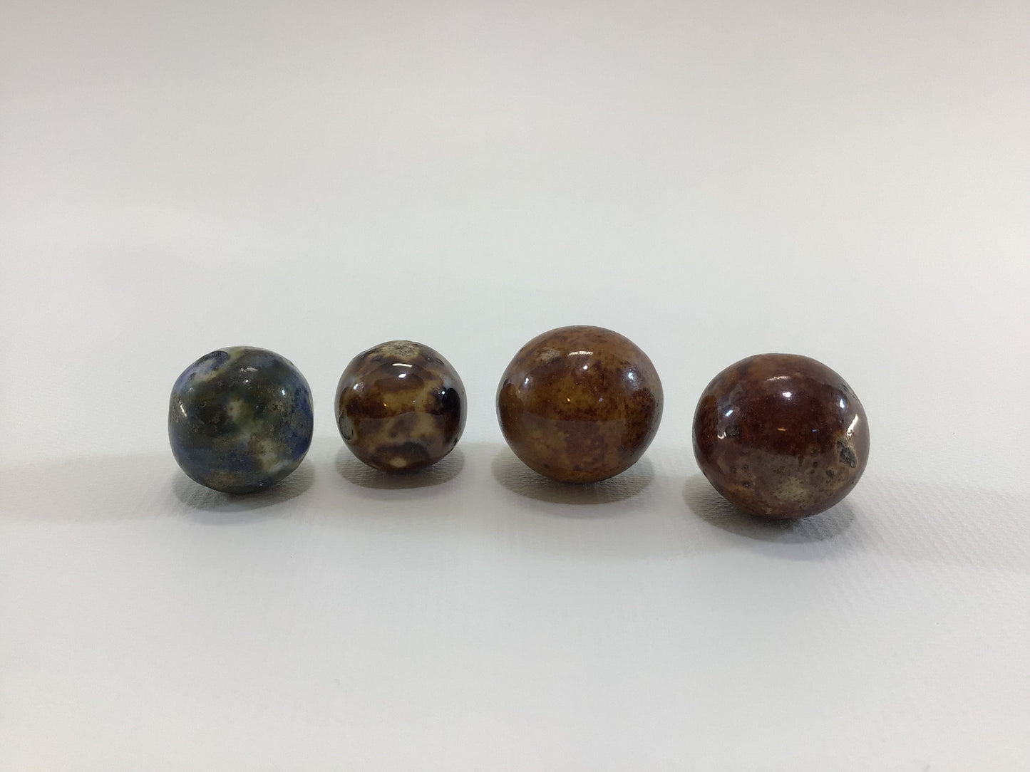 Clay Bennington Marbles Lot of 4 Brown and Blue Antique Primitive Handmade Toy Game Pieces