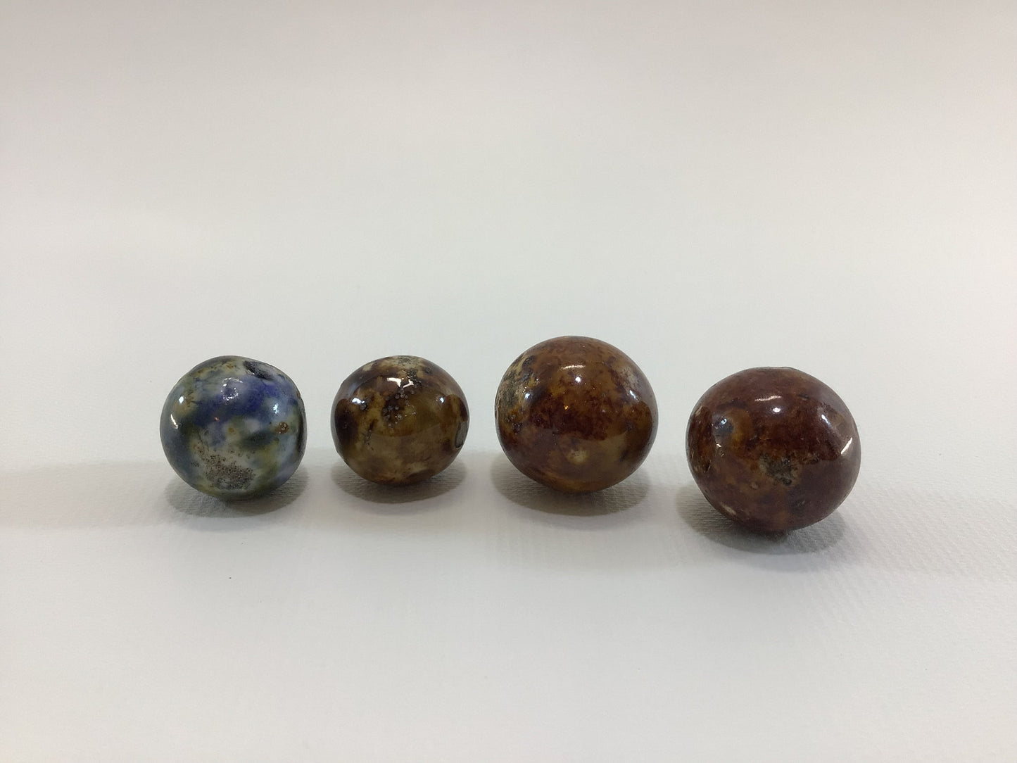 Clay Bennington Marbles Lot of 4 Brown and Blue Antique Primitive Handmade Toy Game Pieces